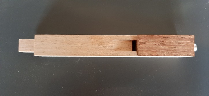 Figure 2 — A set of finished wooden stopped (gedeckt) pipes with leather-padded stoppers