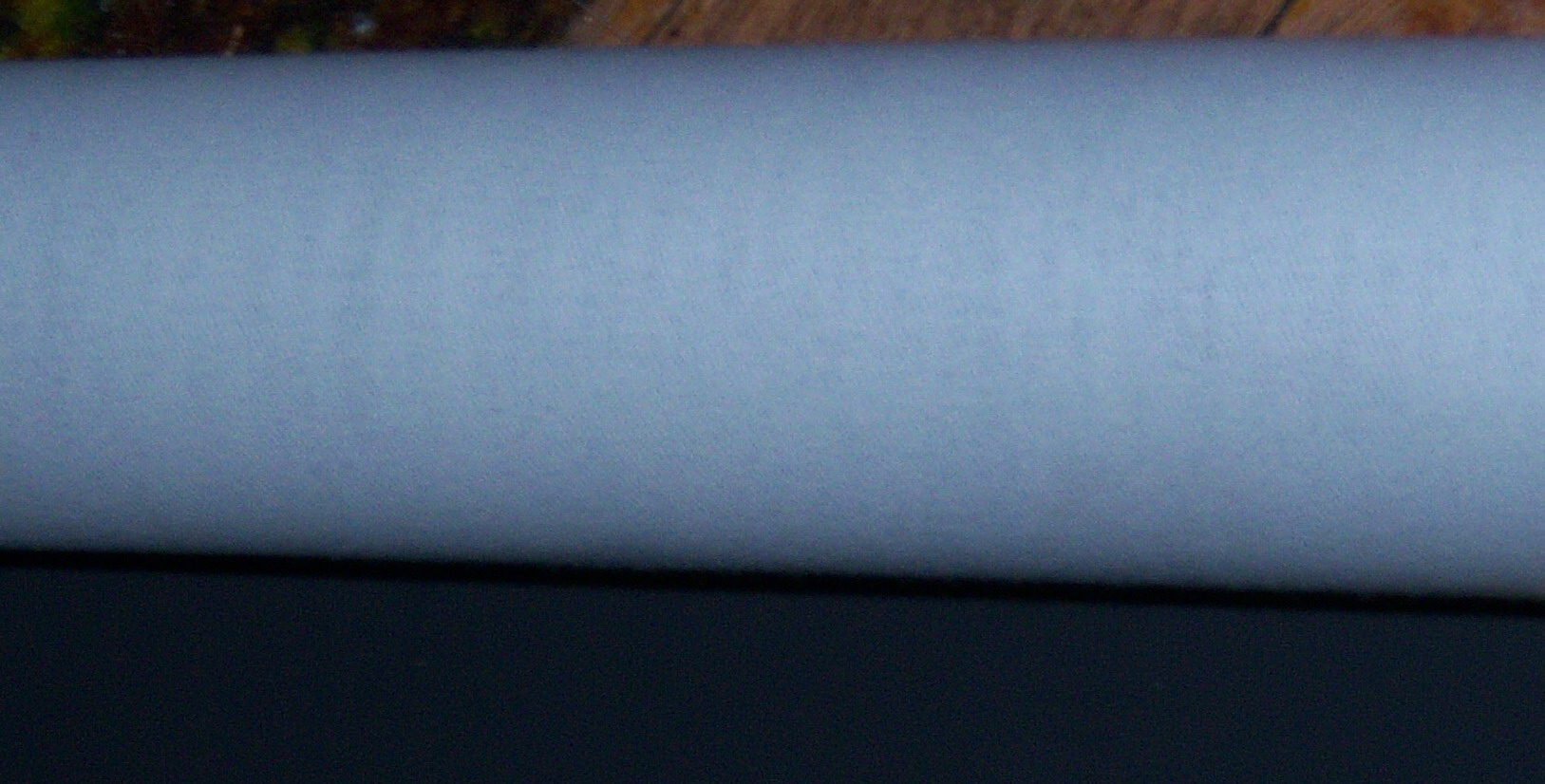 Figure 3 — A roll of rubberized blackout / bellows cloth — the modern 54-inch-wide substitute for bellows leather, glued with a latex contact cement rather than PVA.