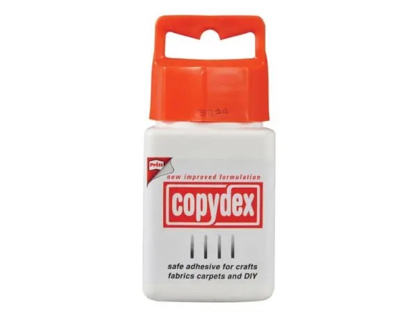Figure 3 — A tin of Copydex latex contact adhesive, used to bond blackout (bellows) cloth, which ordinary PVA will not grip. Real leather, by contrast, glues to wood and itself with PVA.
