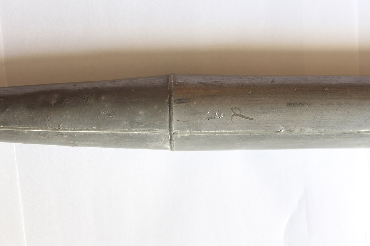 Figure 2 — A tall zinc bass flue pipe with its soldered seam and matt blue-grey oxide film — the customary material for pipes longer than about 4 feet.