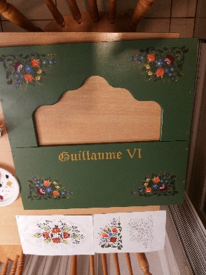 Figure 2 — A South-German/Black-Forest folk-painted (Bauernmalerei) crank-organ case, bright flowers and scrolls on a coloured ground