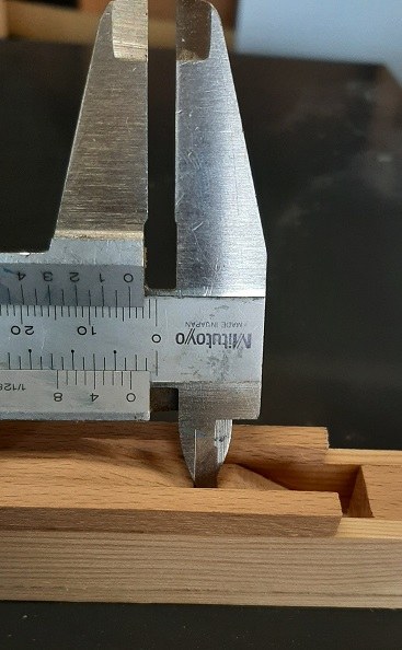 Figure 2 — The mouth of a small wooden flue pipe showing the cut-up, upper lip and languid a voicer adjusts