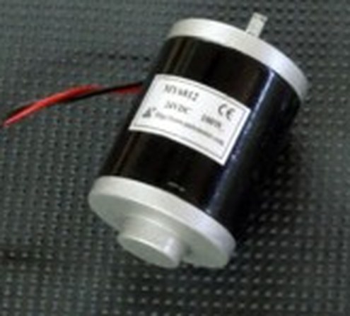 Figure 2 — A 12 V DC gearmotor of the kind sold cheaply for scooters and wheelchairs — a motor with an integral reduction gearbox whose output shaft already turns at the low RPM and high torque a crank organ …