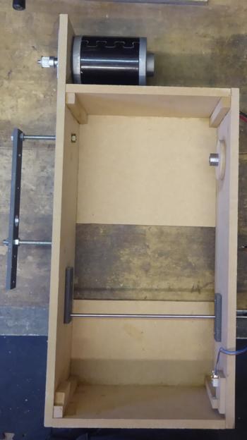 Figure 3 — A motorised automatic roll-player: a self-contained roll box with a motor at the top and a solenoid, sized 190 x 127 mm for the 31-note scale (160 x 127 mm for 20-note), which plays and rewinds a r…